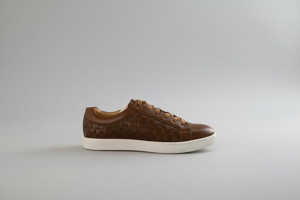 sneakers da uomo in pelle intrecciata color cuoio - Botticelli