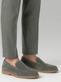 green suede loafer